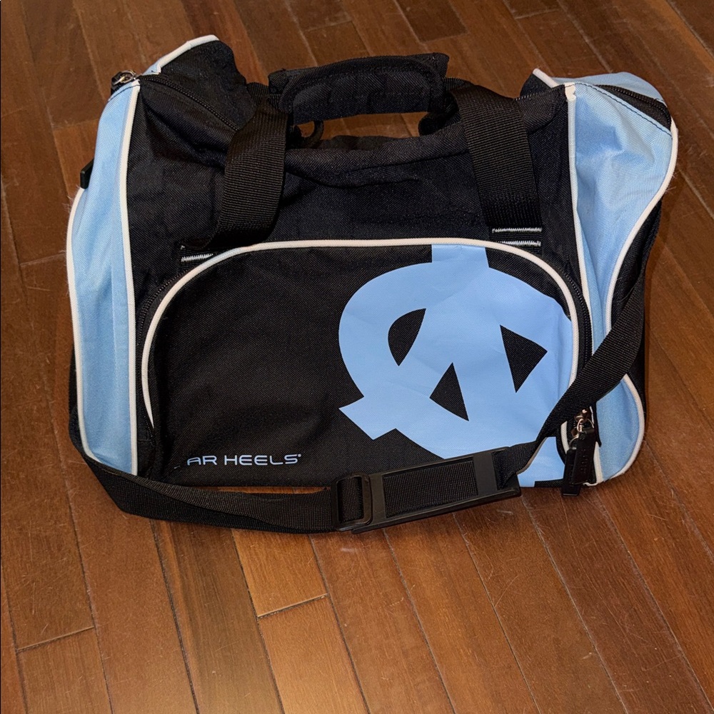 “UNC “Logo Athletic Black and Light Blue UNC Duffel Bag